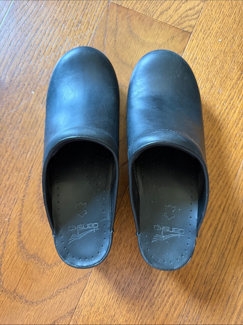 Dansko Black Slip-On Leather Clogs